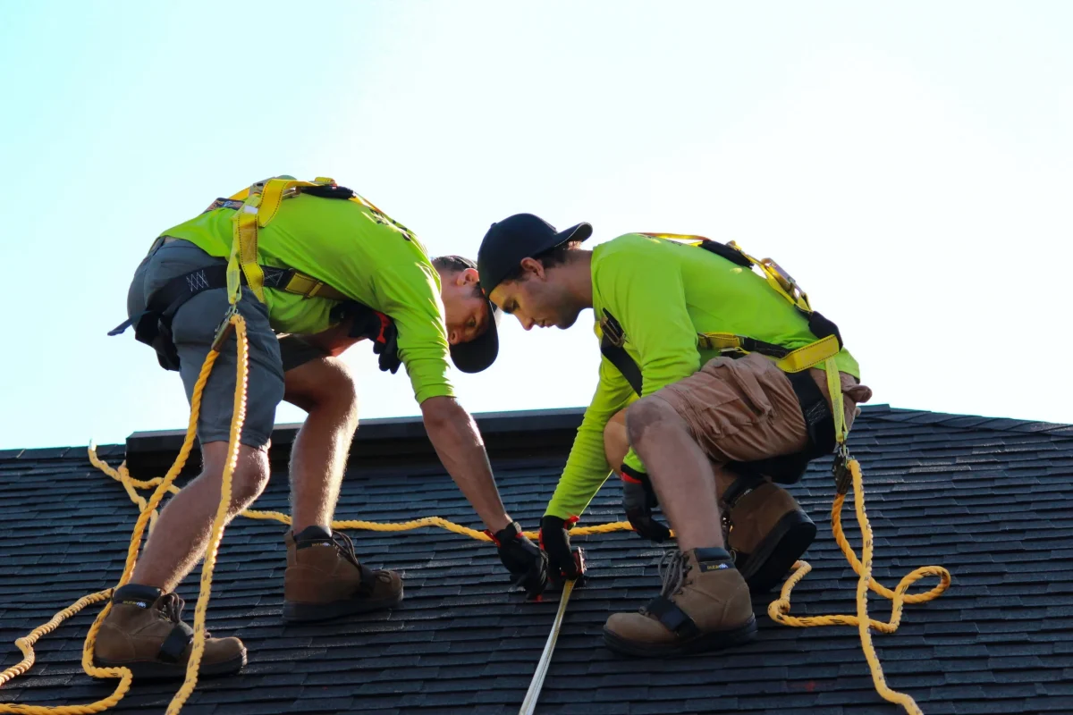 roofers with safety gear